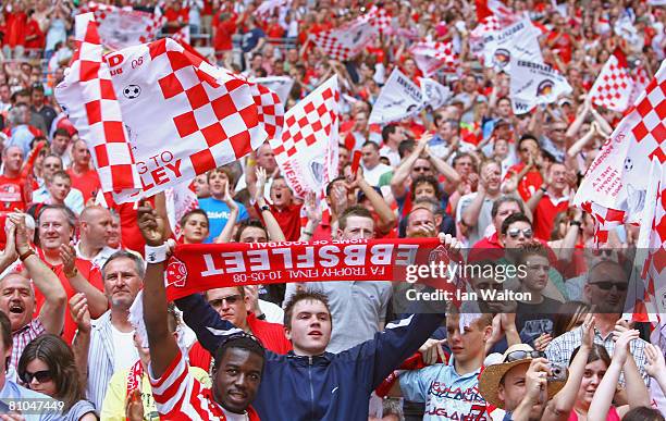 Ebbsfleet fans celebrate their team's victory during the FA Trophy Final between Ebbsfleet United and Torquay United at Wembley Stadium on May 10,...