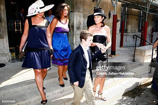 Cecilia Attias and her son Louis Sarkozy leave the town hall of Paris 7th after the civil wedding of Jeanne-Marie Martin and Gurvan Rallon on May 10,...