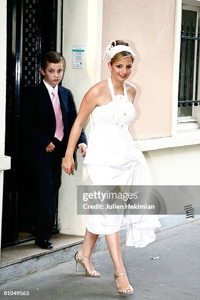 Jeanne-Marie Rallon and her brother Louis sarkozy, leave the Richard Attias house to go to "Pre Catelan Party" on May 10, 2008 in Neuilly France.
