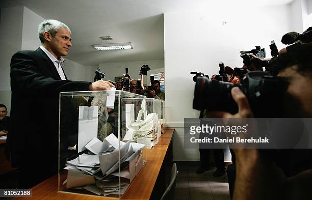 Serbia's pro-western president Boris Tadic pauses for media before casting his vote at a polling station on May 11, 2008 in central Belgrade, Serbia....