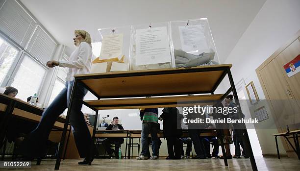 Serbians vote at a polling station on May 11, 2008 in central Belgrade, Serbia. Serbs voted in parliamentary and local elections today which have...