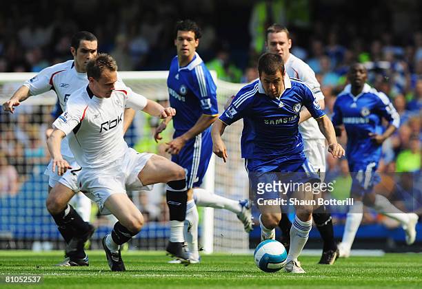 Joe Cole of Chelsea takes on Matthew Taylor of Bolton Wanderers during the Barclays Premier League match between Chelsea and Bolton Wanderers at...