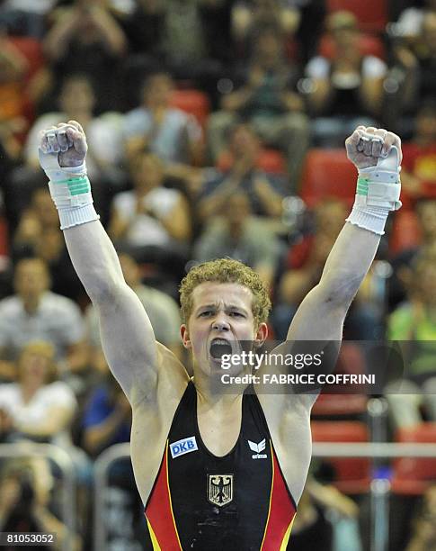 Horizontal bar's world and european champion German Fabian Hambuechen reacts after competing on his favourite apparatus during the 28th European...