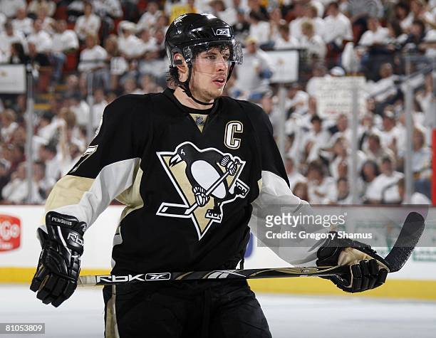 Sidney Crosby of the Pittsburgh Penguins looks on while playing the Philadelphia Flyers in game one of the 2008 NHL Eastern Conference Finals during...