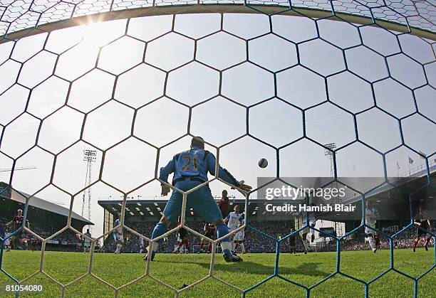 Danny Murphy of Fulham heads the matchwinning goal past Jamie Ashdown of Portsmouth during the Barclays Premier League match between Portsmouth and...