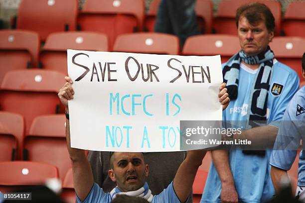 Fans display encouragement for their Manchester City manager Sven Govan Eriksson after they suffer an eight goal defeat in the Barclays Premier...