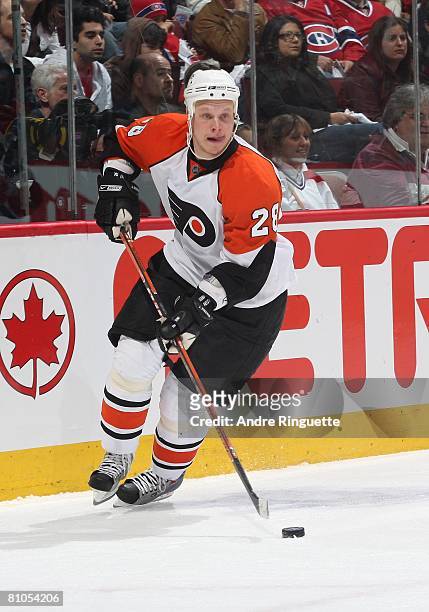 Lasse Kukkonen of the Philadelphia Flyers stickhandles the puck against the Montreal Canadiens during game five of the Eastern Conference Semifinals...