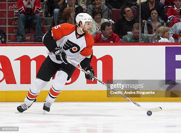 Braydon Coburn of the Philadelphia Flyers stickhandles the puck against the Montreal Canadiens during game five of the Eastern Conference Semifinals...