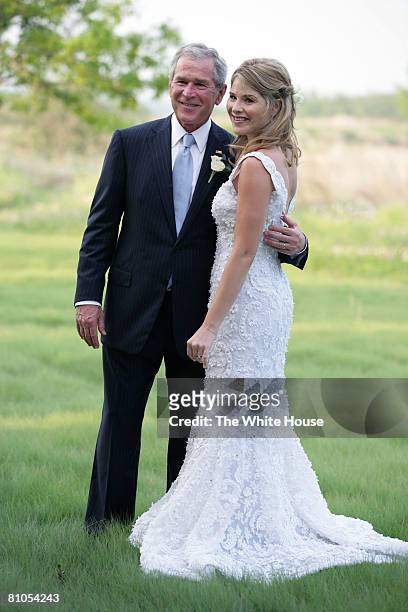 In this handout image provided by the White House, President George W. Bush and Jenna Bush pose for a photographer prior to her wedding to Henry...
