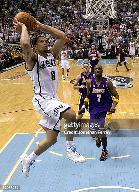 Deron Williams of the Utah Jazz goes for a dunk against the Los Angeles Lakers in Game Four of the Western Conference Semifinals during the 2008 NBA...