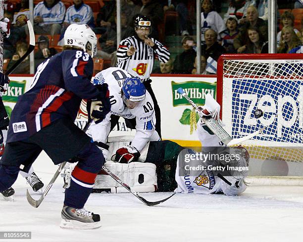 Niklas Backstrom of Finland stops the puck on a shot from Patrick Kane of the United States during the IIHF World Ice Hockey Championship...