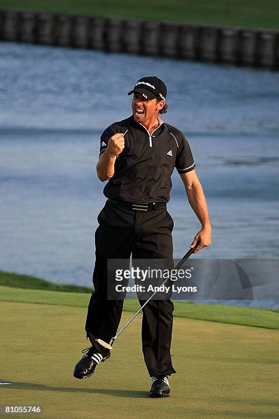 Sergio Garcia of Spain reacts to his made par putt on the green of the 18th hole during the final round of THE PLAYERS Championship on THE PLAYERS...