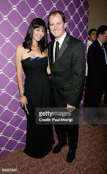 Catherine Bell and Adam Beason pose for a photo at the Bloomberg Pre-Dinner Cocktail Reception at the Washington Hilton on April 26, 2008 in...