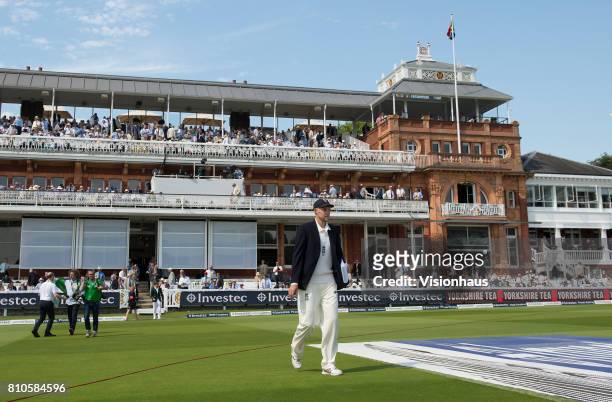 Joe Root walks onto the Lord's pitch to perform his first coin toss as England captain during Day One of the 1st Investec Test Match between England...