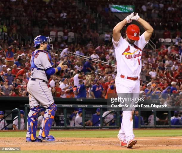 The St. Louis Cardinals' Paul DeJong returns to the dugout after striking out to end the game against the New York Mets on Friday July 7 at Busch...
