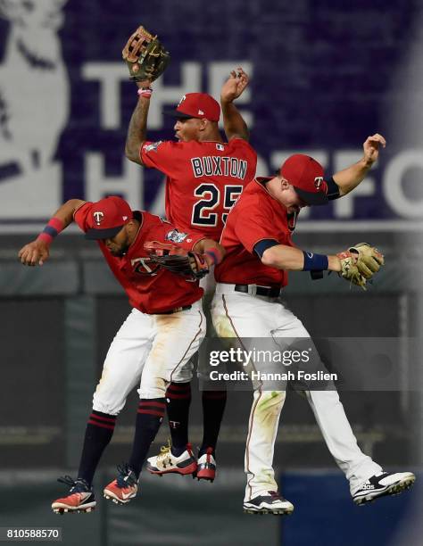 Eddie Rosario, Byron Buxton and Max Kepler of the Minnesota Twins celebrates winning the game against the Baltimore Orioles on July 7, 2017 at Target...