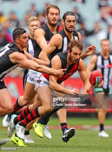 Jobe Watson of the Bombers runs with the ball during the round 16 AFL match between the Collingwood Magpies and the Essendon Bombers at Melbourne...