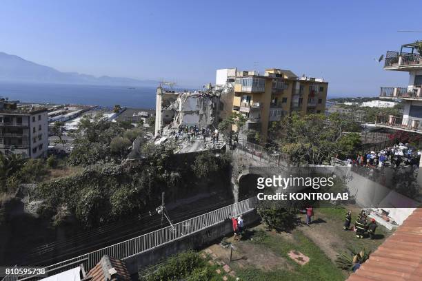 The area of the collapsed palace at Torre Annunziata, near Naples, southern Italy. At the early lights of the morning, a five-story palace suddenly...