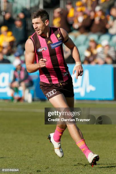 Ricky Henderson of the Hawks celebrates a goal during the round 16 AFL match between the Hawthorn Hawks and the Greater Western Sydney Giants at...