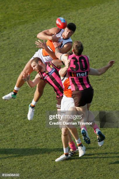 Jonathon Patton of the Giants attempts to mark the ball during the round 16 AFL match between the Hawthorn Hawks and the Greater Western Sydney...