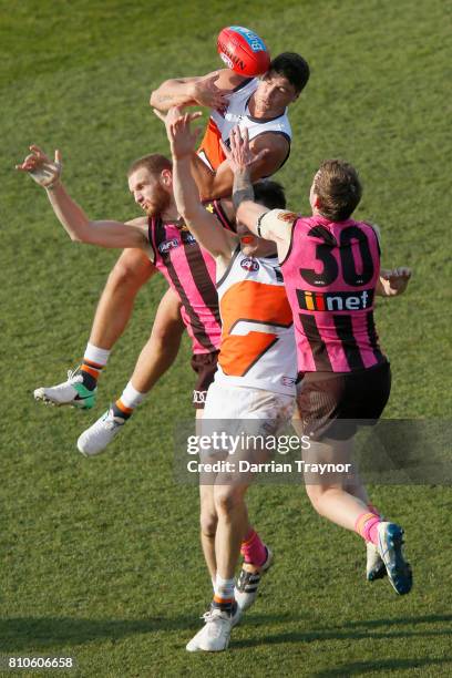 Jonathon Patton of the Giants attempts to mark the ball during the round 16 AFL match between the Hawthorn Hawks and the Greater Western Sydney...