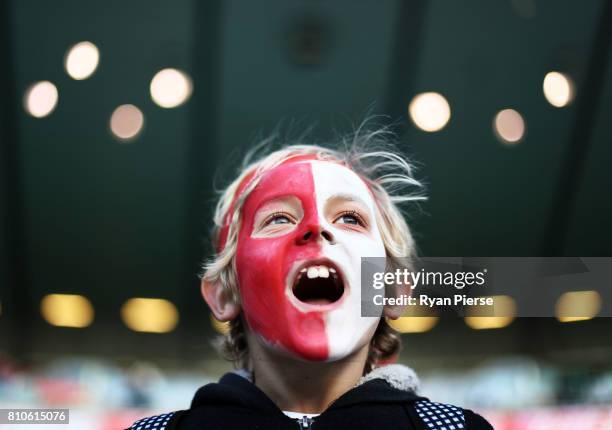 Swans fan cheers during the round 16 AFL match between the Sydney Swans and the Gold Coast Suns at Sydney Cricket Ground on July 8, 2017 in Sydney,...