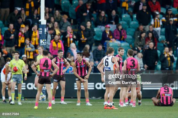 Confusion sets in as the final siren sounds and draw is declared before Hawthorn could rush a point to win the game during the round 16 AFL match...