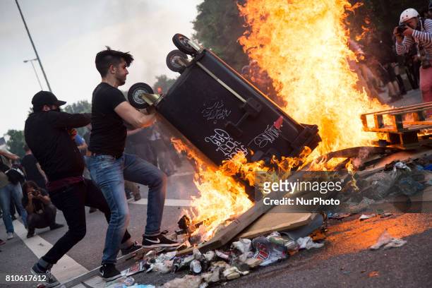 Protesters set fire on barricade during riots in St. Pauli district during G 20 summit in Hamburg on July 8, 2017 . Authorities are braced for...