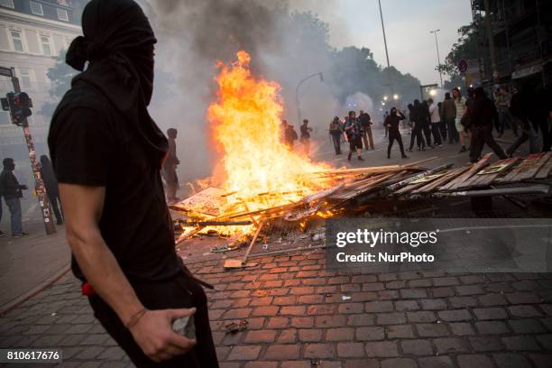 Protester near barricade during riots in St. Pauli district during G 20 summit in Hamburg on July 8, 2017 . Authorities are braced for large-scale...