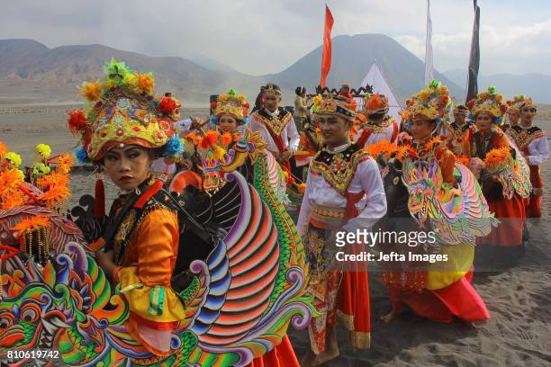 Dancers perform during the cultural ceremony 'Yadnya Kasada' to make an offering to their god at the plateau of Mount Bromo on July 7, 2017 in...