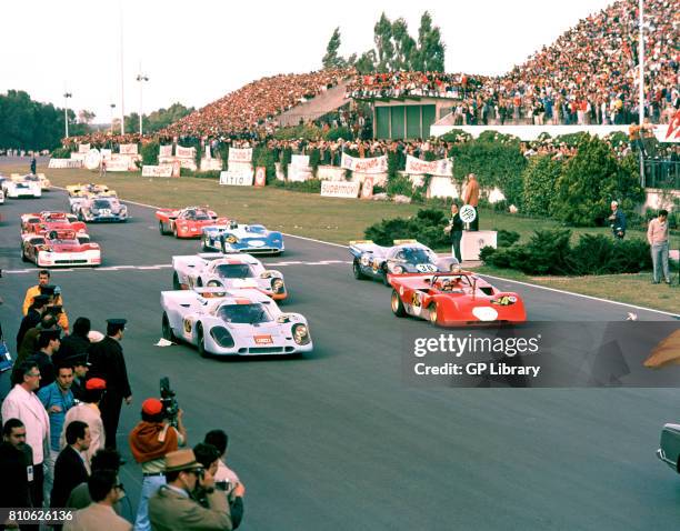 Pedro Rodriguez in a Porsche 917 2nd and Arturo Merzario in a Ferrari 312PB at the Start of Buenos Aires 1000Ks.