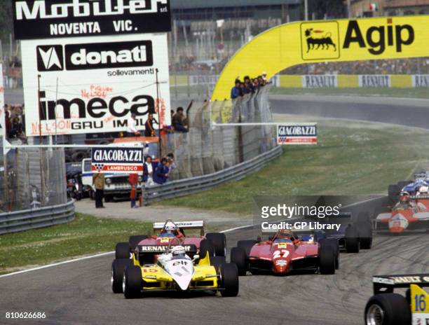 Alain Prost in a Renault RE30B, Gilles Villeneuve 2nd and Didier Pironi 1st in Ferrari 126C2s at Imola, San Marino GP.