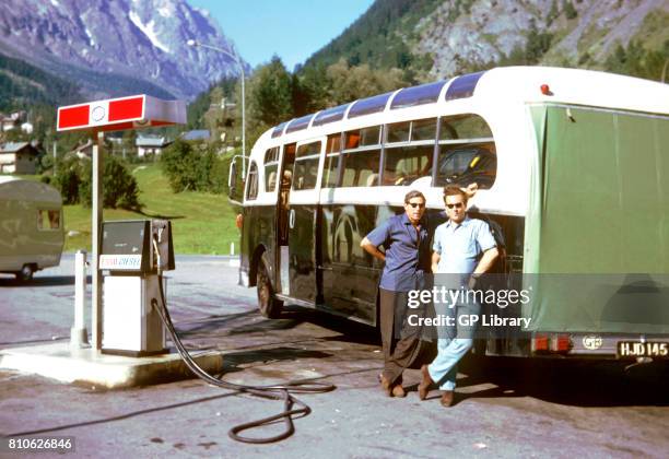 John Allen and Tipper Wilson with a Ferrari 275GTB/C Refuelling AEC 'Hannibal' Aosta, Italy.