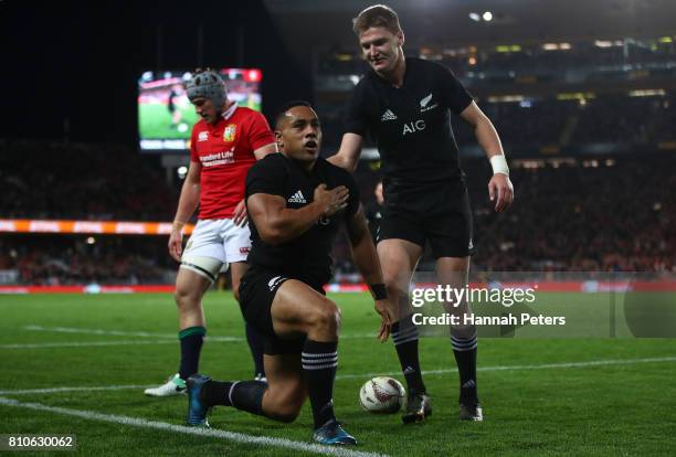 Ngani Laumape of the All Blacks is congratulated by teammate Jordie Barrett of the All Blacks after scoring the opening try during the third test...