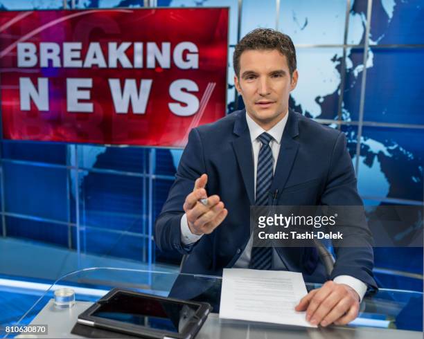 newsreader in television studio - newscaster stock pictures, royalty-free photos & images