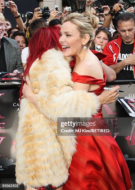 Designer Patricia Field greets actress Kim Catrall as they attend the World Premiere of 'Sex And The City' held at the Odeon Leicester Square on May...