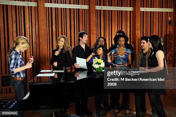 American Idol contestants Brooke White, David Cook, Kristy Lee Cook, Michael Johns, Jason Castro, Ramiele Malubay, and Syesha Mercado rehearses in...