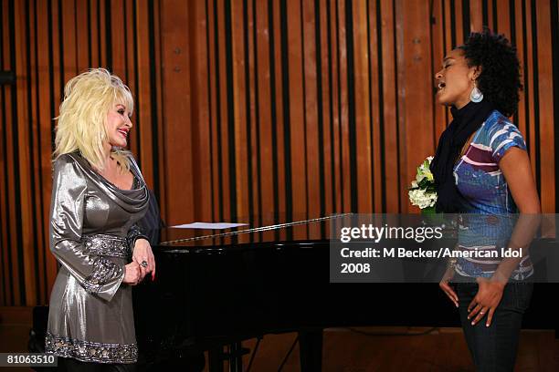 American Idol contestant Syesha Mercado rehearses in the studio with country singer Dolly Parton on March 29, 2008 in Los Angeles, California.