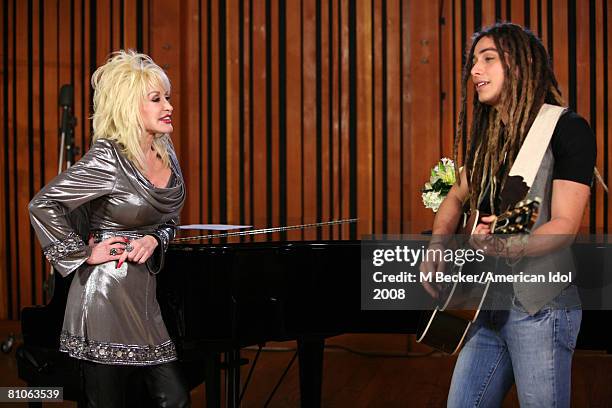 American Idol contestant Jason Castro rehearses in the studio with country singer Dolly Parton on March 29, 2008 in Los Angeles, California.