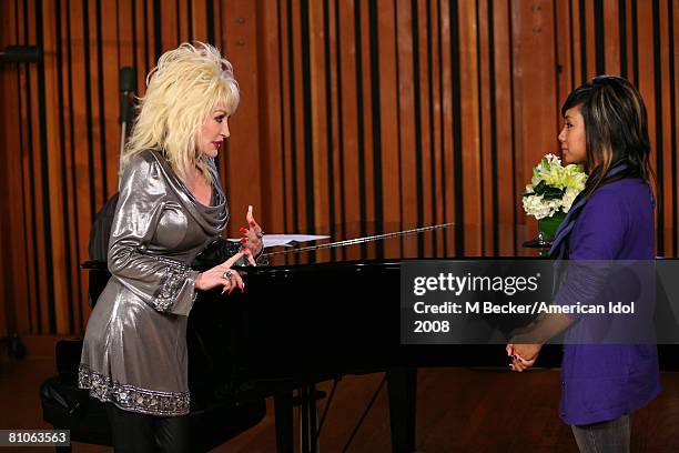 American Idol contestant Ramiele Malubay rehearses in the studio with country singer Dolly Parton on March 29, 2008 in Los Angeles, California.