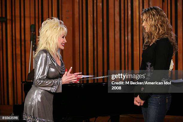 American Idol contestant Kristy Lee Cook rehearses in the studio with country singer Dolly Parton on March 29, 2008 in Los Angeles, California.