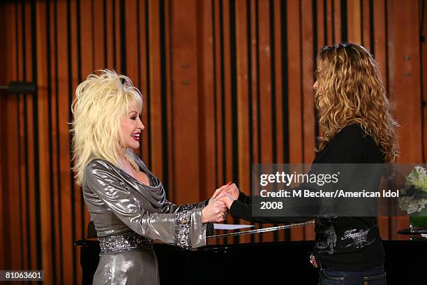 American Idol contestant Kristy Lee Cook rehearses in the studio with country singer Dolly Parton on March 29, 2008 in Los Angeles, California.