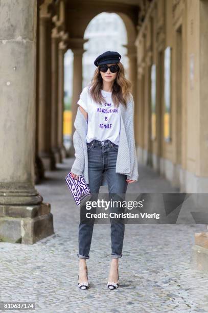 Alexandra Lapp wearing a T-Shirt from H&M, printed with The Revolution Is Female, a high waist, non-strech denim, five-pocket 501 skinny jeans from...