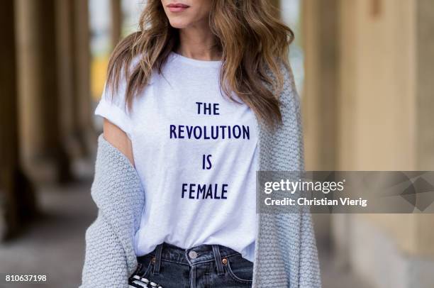 Alexandra Lapp wearing a T-Shirt from H&M, printed with The Revolution Is Female, a high waist, non-strech denim, five-pocket 501 skinny jeans from...