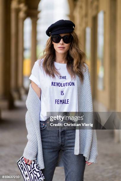 Alexandra Lapp wearing a T-Shirt from H&M, printed with The Revolution Is Female, a high waist, non-strech denim, five-pocket 501 skinny jeans from...