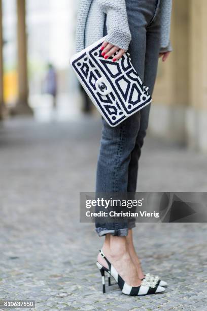Alexandra Lapp wearing a T-Shirt from H&M, printed with The Revolution Is Female, a high waist, non-strech denim, five-pocket 501 skinny jeans from...
