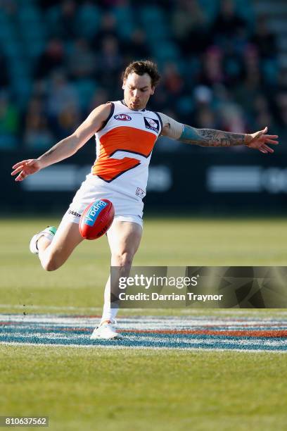 Nathan Wilson of the Giants kicks the ball during the round 16 AFL match between the Hawthorn Hawks and the Greater Western Sydney Giants at...