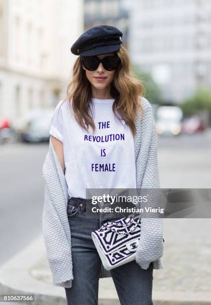 Alexandra Lapp wearing a T-Shirt from H&M, printed with The Revolution Is Female, a high waist, non-strech denim, five-pocket 501 skinny jeans from...