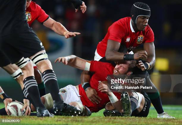 Alun Wyn Jones of the Lions is felled by a high tackle from Jerome Kaino of the All Blacks during the third test match between the New Zealand All...