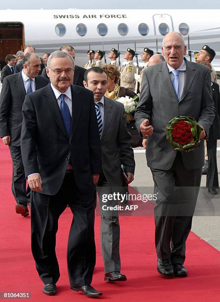 Azerbaijan's Prime Minister Arthur Rasizade welcomes Swiss President Pascal Couchepin upon his arrival at Baku airport on May 10, 2008. Couchepin is...